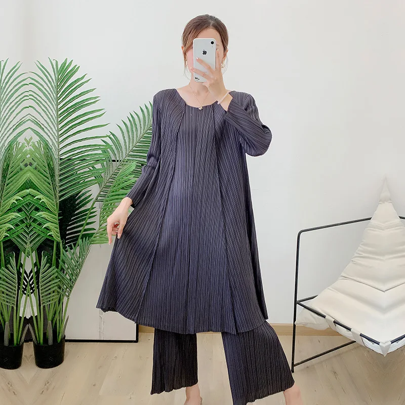 Pleated fashion suit women's summer irregular top loose wide-leg pants two-piece high-end
Pleated fashion suit women's summer irregular top loose wide-leg pants two-piece high-end