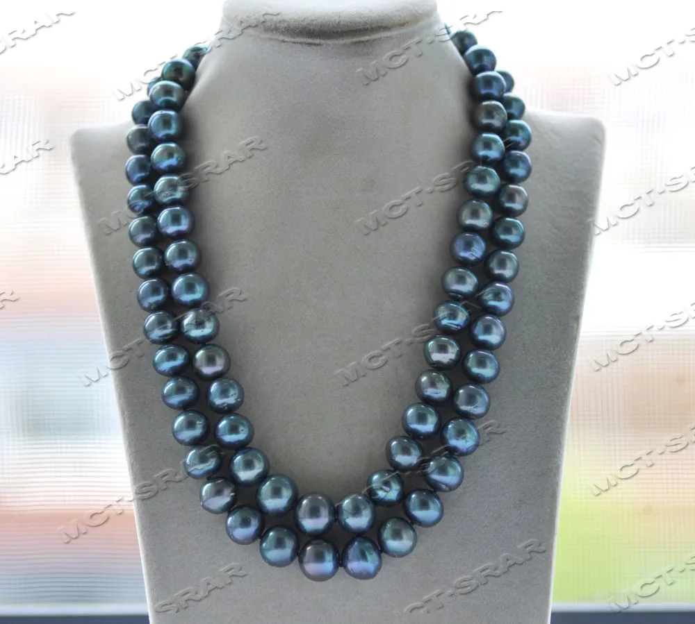 Z12139 2Row 19'' 15mm Peacock-Black Round Keshi Edison Pearl Necklace "8" CZ
Z12139 2Row 19'' 15mm Peacock-Black Round Keshi Edison Pearl Necklace "8" CZ