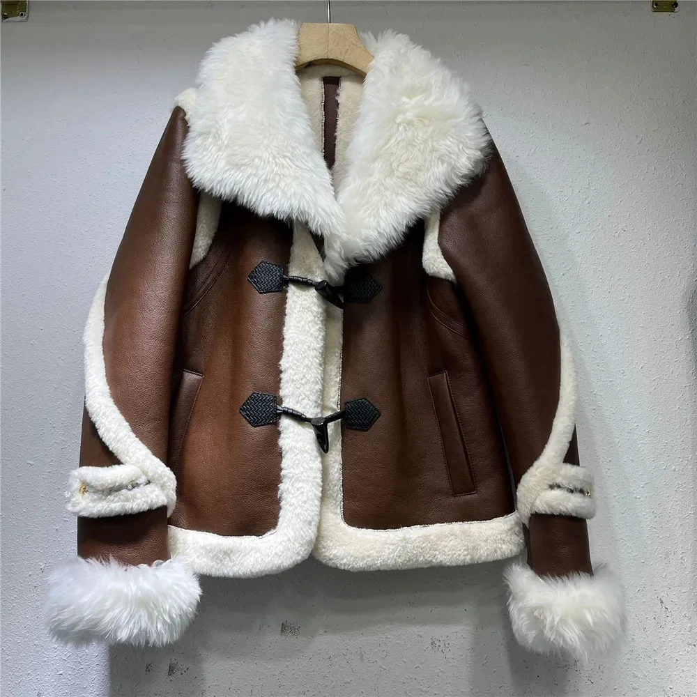 2023 Winter New Wool collar double faced fur coats for women motorcycle leather jacket Female fashion Loose outerwear Y4397
2023 Winter New Wool collar double faced fur coats for women motorcycle leather jacket Female fashion Loose outerwear Y4397