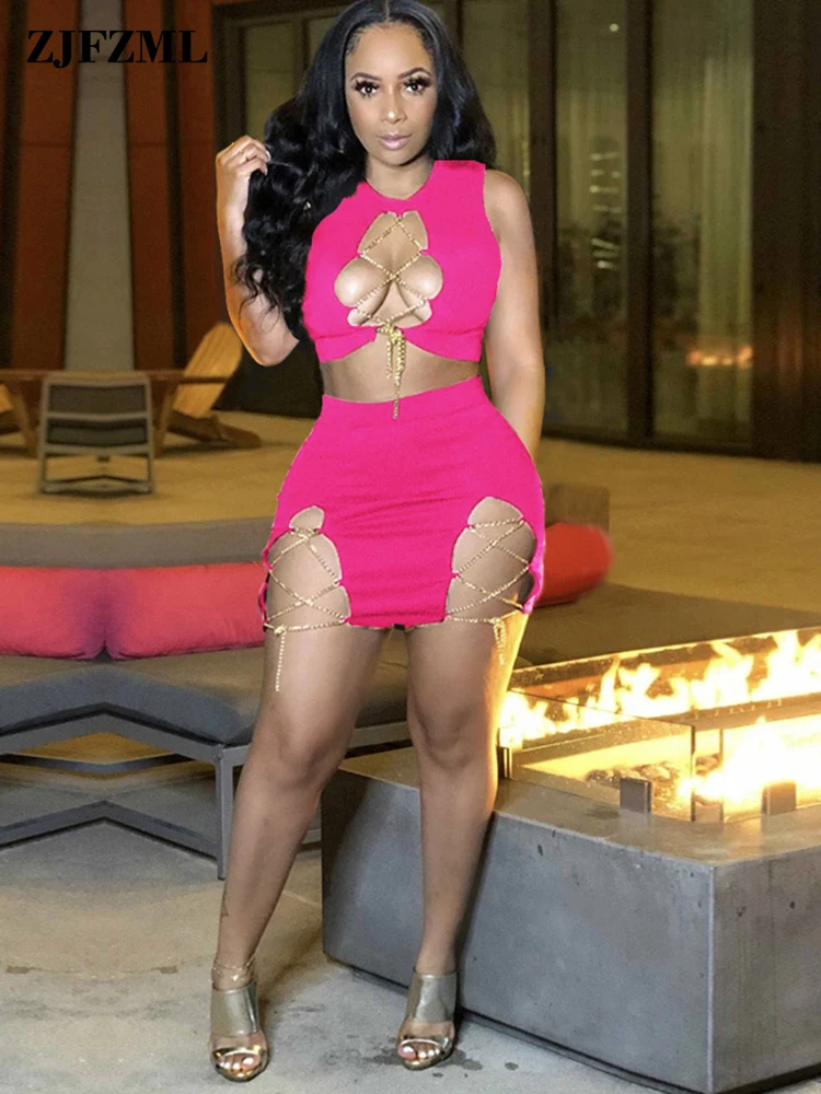 Metal Chain Lace Up Hollow Out 2 Piece Club Outfits Long Sleeve Bandage Crop Top and High Waist Mini Skirt Spring Matching Suit
Metal Chain Lace Up Hollow Out 2 Piece Club Outfits Long Sleeve Bandage Crop Top and High Waist Mini Skirt Spring Matching Suit