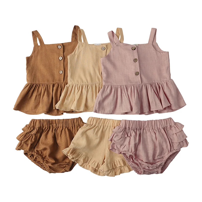 New cotton and linen girls' baby suit summer sling top four-corner ruffled shorts girls 2-piece set.
New cotton and linen girls' baby suit summer sling top four-corner ruffled shorts girls 2-piece set.