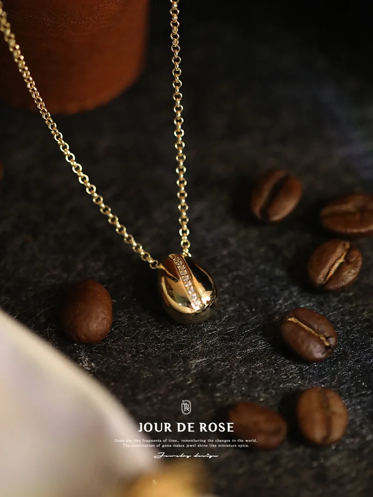 "Weekend Breakfast" S925 Sterling Silver Gold Plated Coffee Bean Retro Design Exquisite Tide Clavicle Necklace Pendant Women
"Weekend Breakfast" S925 Sterling Silver Gold Plated Coffee Bean Retro Design Exquisite Tide Clavicle Necklace Pendant Women