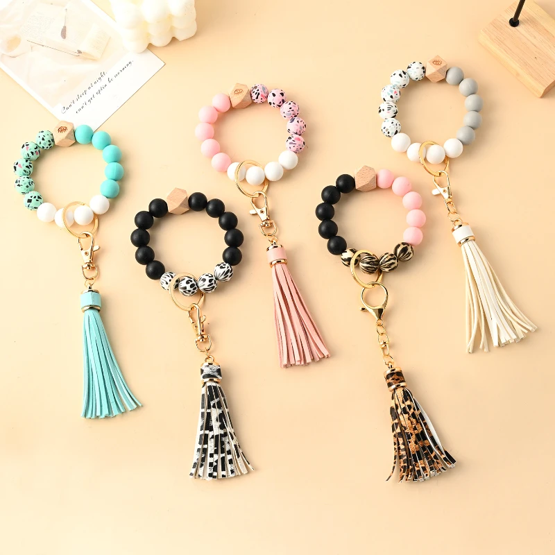 Fashion Silicone Beaded Wrist Strap Key Chain Accessories Ladies Bracelet Jewelry Charm Keychain with Tassel Bag Pendant YS195
Fashion Silicone Beaded Wrist Strap Key Chain Accessories Ladies Bracelet Jewelry Charm Keychain with Tassel Bag Pendant YS195