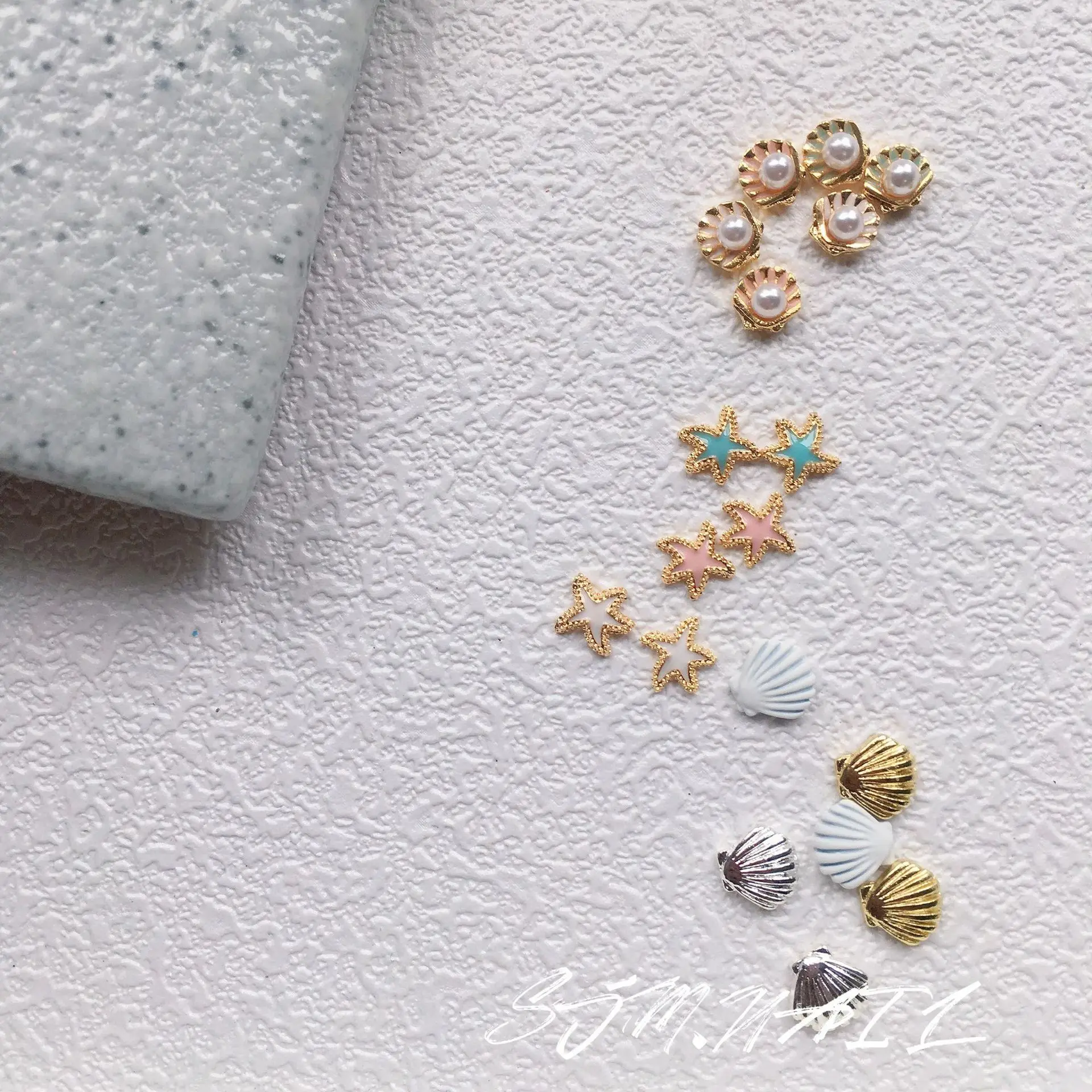 10pcs NAIL Marine Shell Charms SUMMER Starfish Nail Decors Chrome Shell Rivets Pearl Clam Mussel Metal Summer Sea Nail Trinkets
10pcs NAIL Marine Shell Charms SUMMER Starfish Nail Decors Chrome Shell Rivets Pearl Clam Mussel Metal Summer Sea Nail Trinkets
