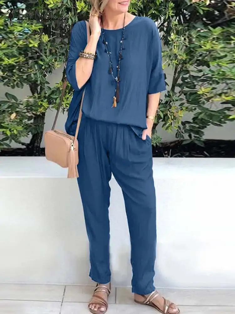 ZANZEA 2023 Solid Matching Sets Fashion 2pcs Pant Sets Women Half Sleeve Tops Outfit Casual Elastic Waist Long Trouser Tracksuit
ZANZEA 2023 Solid Matching Sets Fashion 2pcs Pant Sets Women Half Sleeve Tops Outfit Casual Elastic Waist Long Trouser Tracksuit