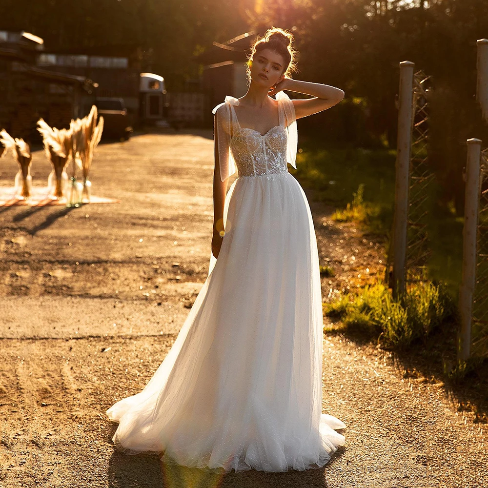Spaghetti Straps Sweetheart Beach Wedding Dress For Women 2022 Sequined Lace Appliques Sleeveless Bridal Gown Dots Tulle Boho
Spaghetti Straps Sweetheart Beach Wedding Dress For Women 2022 Sequined Lace Appliques Sleeveless Bridal Gown Dots Tulle Boho