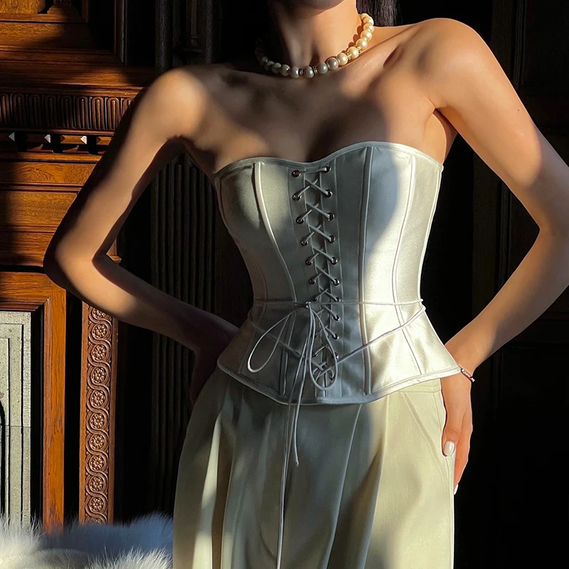 2022 summer new satin small camisole high quality women's fashion sexy lace up short fishbone tube top with strapless wrap top
2022 summer new satin small camisole high quality women's fashion sexy lace up short fishbone tube top with strapless wrap top