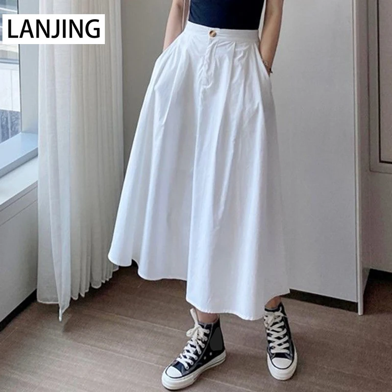 Женская юбка средней длины, черная однотонная белая юбка А-силуэта в Корейском стиле, осень 2021
Женская юбка средней длины, черная однотонная белая юбка А-силуэта в Корейском стиле, осень 2021