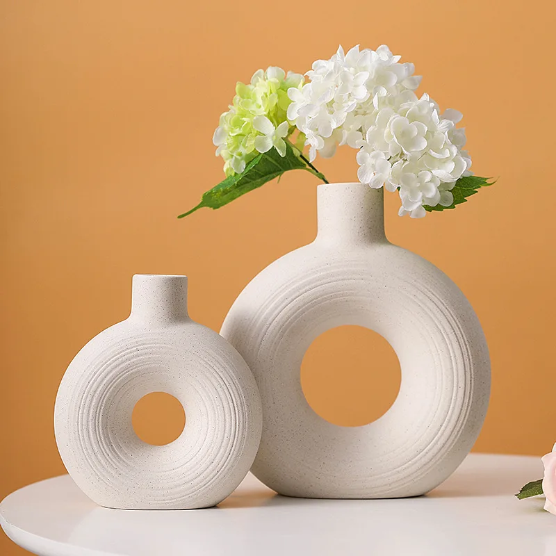 Ceramic Hollow Vase Nordic Circular Hollow Ceramic Flower Vase Office Living Room Desktop Interior Home Decoration Accessories
Ceramic Hollow Vase Nordic Circular Hollow Ceramic Flower Vase Office Living Room Desktop Interior Home Decoration Accessories