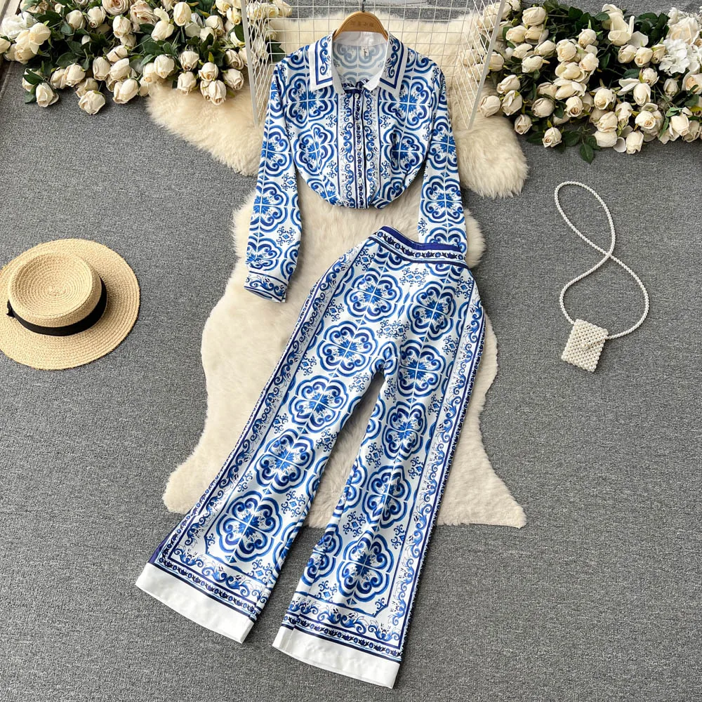 Europe and the United States Fashionable Print Lapel Long-sleeved Shirt + Casual Wide-legged Pants Temperament Two-piece Set
Europe and the United States Fashionable Print Lapel Long-sleeved Shirt + Casual Wide-legged Pants Temperament Two-piece Set