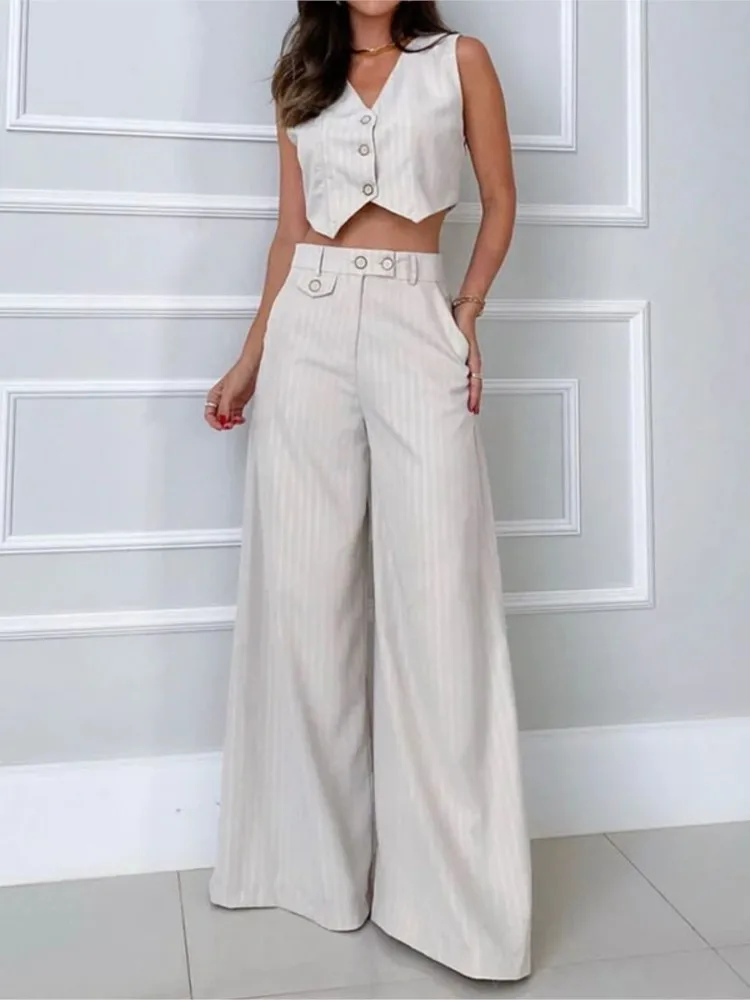 Женский Повседневный комплект из двух предметов, однотонный пикантный Топ без рукавов с V-образным вырезом и свободные элегантные брюки с широкими штанинами, лето 2023
Женский Повседневный комплект из двух предметов, однотонный пикантный Топ без рукавов с V-образным вырезом и свободные элегантные брюки с широкими штанинами, лето 2023