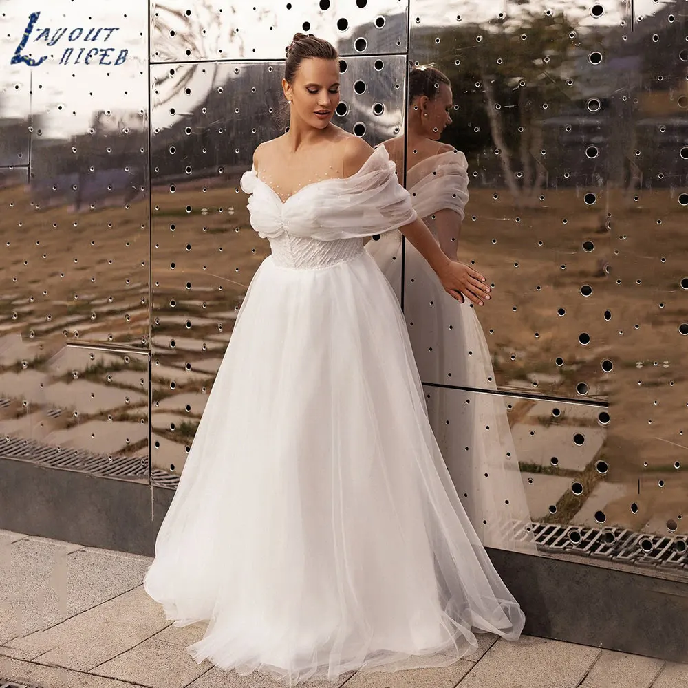 LAYOUT NICEB Elegant O-Neck Off Shoulder Wedding Dresses Vintage A-Line Tulle Bridal Gowns Backless Vestido De Novia Custom Made
LAYOUT NICEB Elegant O-Neck Off Shoulder Wedding Dresses Vintage A-Line Tulle Bridal Gowns Backless Vestido De Novia Custom Made
