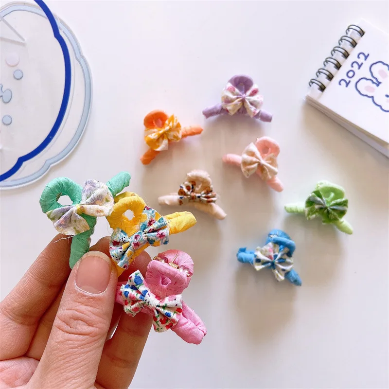 Korean Version of The Colorful Floral Fabric Sweet Bow Side Clip Single Small Grab Clip for Children's Fashion Hair Accessories
Korean Version of The Colorful Floral Fabric Sweet Bow Side Clip Single Small Grab Clip for Children's Fashion Hair Accessories