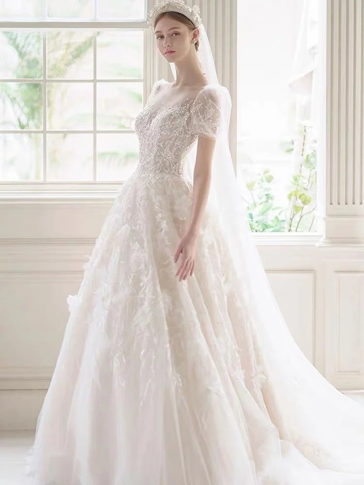White Luxury Wedding Dresses O-Neck Puff Sleeves Lace Appliques Swan Flower Beaded Sweep Train Vintage A-Line Bridal Gowns New
White Luxury Wedding Dresses O-Neck Puff Sleeves Lace Appliques Swan Flower Beaded Sweep Train Vintage A-Line Bridal Gowns New