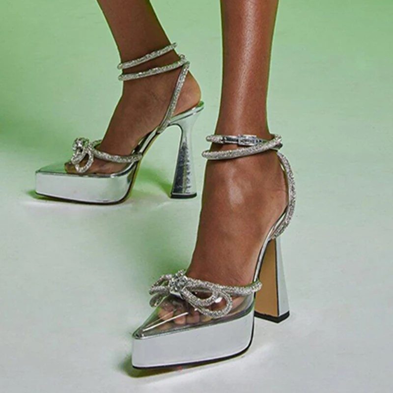 Platform Crystal Bow Satin Sandals Clear PVC Rhinestone Pointed Toe Square Heel Ankle Strap Buckle Bling Roman Sexy Woman Shoes
Platform Crystal Bow Satin Sandals Clear PVC Rhinestone Pointed Toe Square Heel Ankle Strap Buckle Bling Roman Sexy Woman Shoes