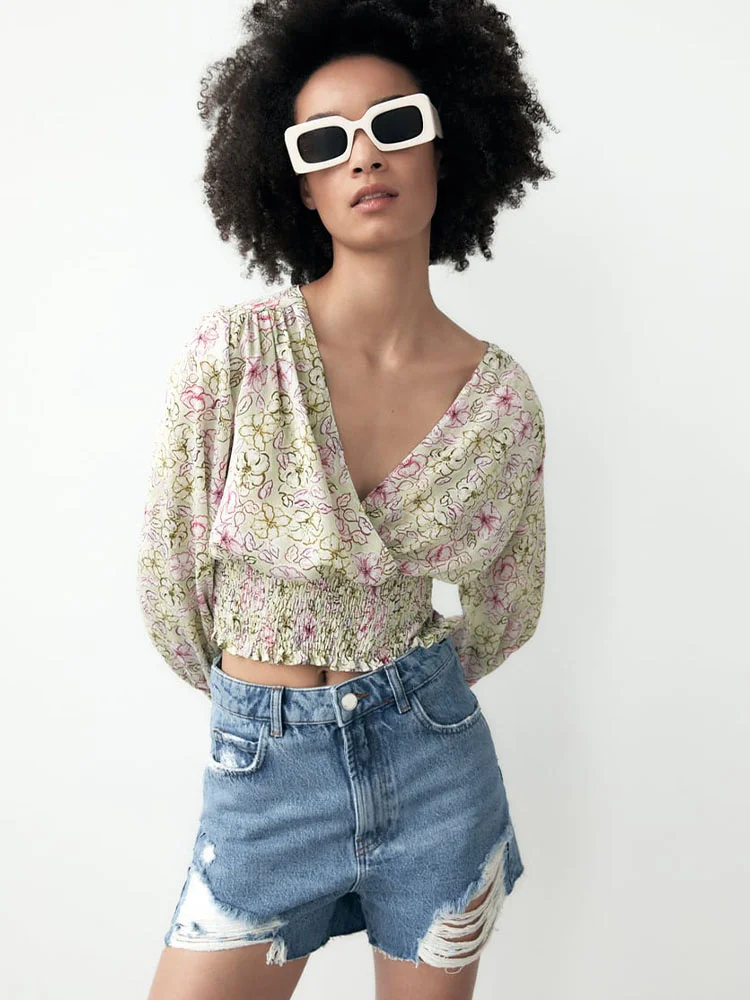 Spring new women's all-match deep V low-cut honeycomb elastic waist floral print shirt top
Spring new women's all-match deep V low-cut honeycomb elastic waist floral print shirt top