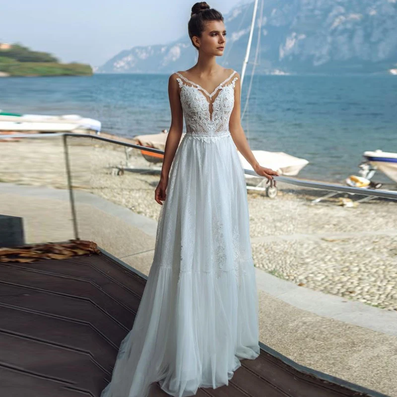 Boho Beach V-neck Tulle Wedding Dress 2023 Lace Applique Bow Princess Illusion Back Sleeveless For Women Custom Made Measures
Boho Beach V-neck Tulle Wedding Dress 2023 Lace Applique Bow Princess Illusion Back Sleeveless For Women Custom Made Measures