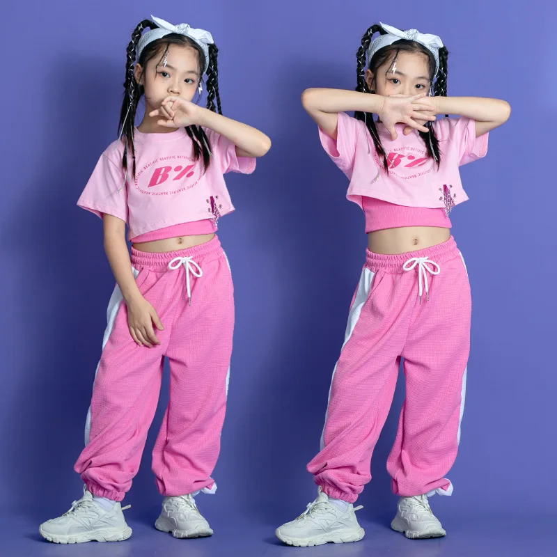 Костюм женский хлопковый для танцев, укороченный танцевальный костюм для девушек 3-15 лет, бандажная юбка в стиле хип-хоп, летняя одежда для выступлений
Костюм женский хлопковый для танцев, укороченный танцевальный костюм для девушек 3-15 лет, бандажная юбка в стиле хип-хоп, летняя одежда для выступлений