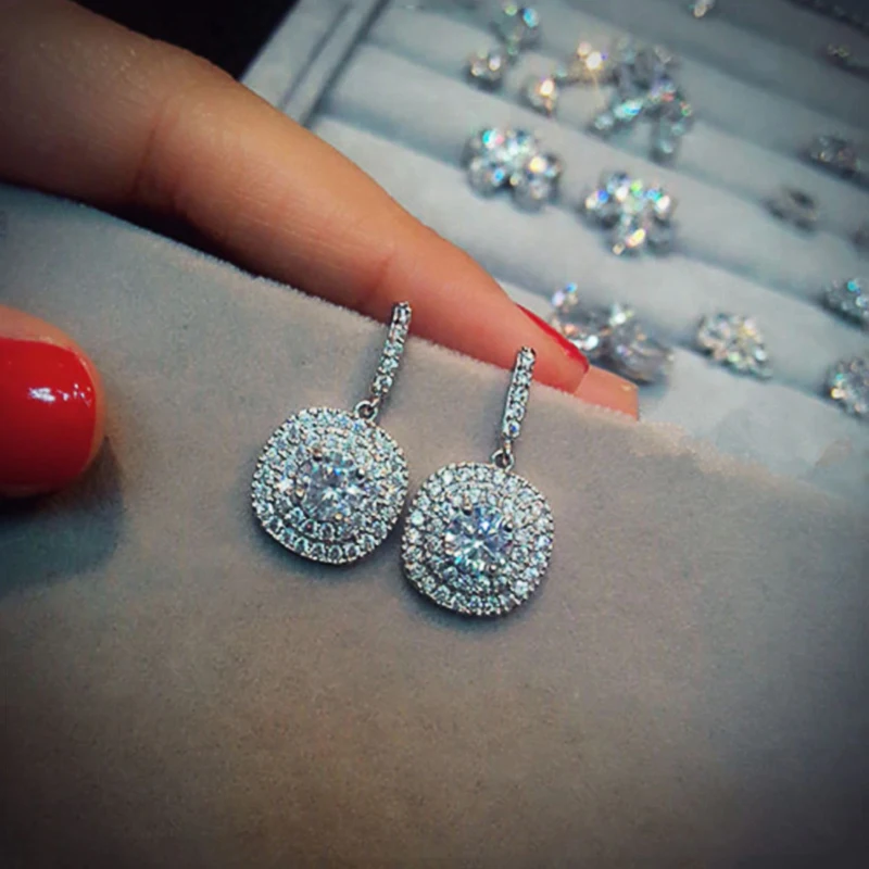 New Luxury Silver Color Crystal CZ Dangle Earrings Women Simple Elegant Design Bridal Wedding Earrings High Quality Jewelry
New Luxury Silver Color Crystal CZ Dangle Earrings Women Simple Elegant Design Bridal Wedding Earrings High Quality Jewelry