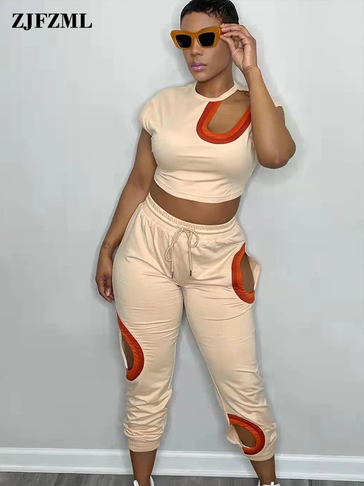 Hollow Out Asymmetrical Shape Two Piece Pant Sets Active Women Short Sleeve Bandage Crop Top and Drawstring Waist Workout Pants
Hollow Out Asymmetrical Shape Two Piece Pant Sets Active Women Short Sleeve Bandage Crop Top and Drawstring Waist Workout Pants