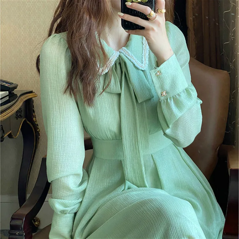 French Retro Dress Women Casual Ruffled Collar Long Sleeve Vintage Bow Solid Fairy Chic Party One-Piece Dress Women Korean Style
French Retro Dress Women Casual Ruffled Collar Long Sleeve Vintage Bow Solid Fairy Chic Party One-Piece Dress Women Korean Style