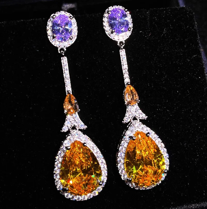 ANGLANG Creative Hanging Earrings with Purple/Yellow Shiny CZ Stone Luxury Wedding Earrings for Women Fashion Jewelry
ANGLANG Creative Hanging Earrings with Purple/Yellow Shiny CZ Stone Luxury Wedding Earrings for Women Fashion Jewelry