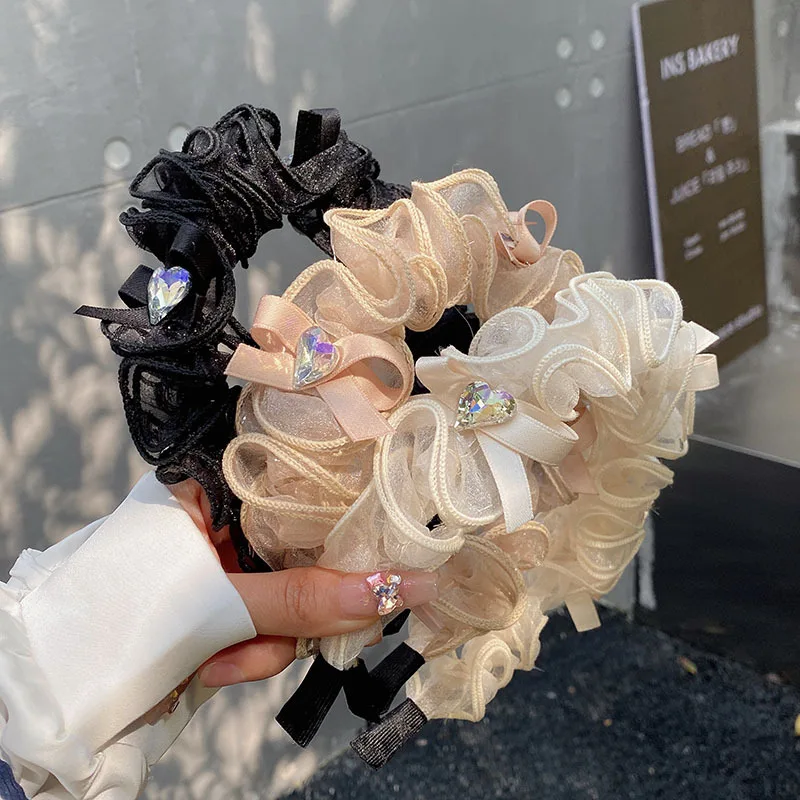 2023 Women Korean version of new spring/summer pleated bow tie with love lace and wide headbands
2023 Women Korean version of new spring/summer pleated bow tie with love lace and wide headbands