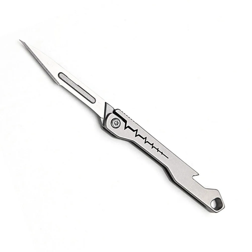 Small Titanium Alloy Folding Blade Cutting Tool Portable Travel Outdoor Multi-function Key Chain 10 Blades
Small Titanium Alloy Folding Blade Cutting Tool Portable Travel Outdoor Multi-function Key Chain 10 Blades