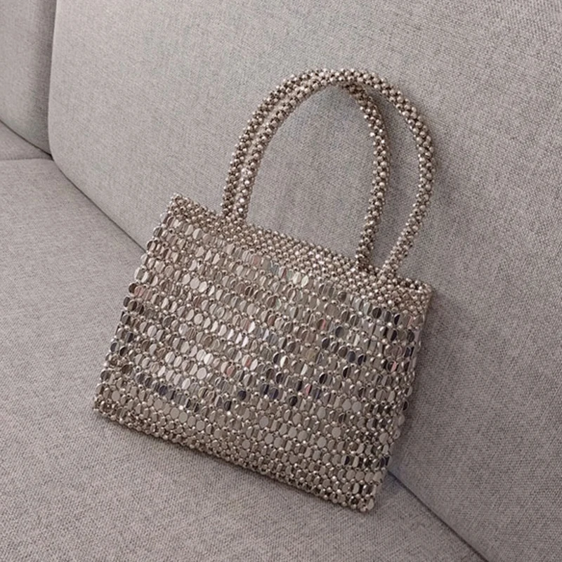 hand-woven beaded bags women shoulder luxury design handbag retro metal shiny bag Niche sequined pearl bag shopping bag purse
hand-woven beaded bags women shoulder luxury design handbag retro metal shiny bag Niche sequined pearl bag shopping bag purse