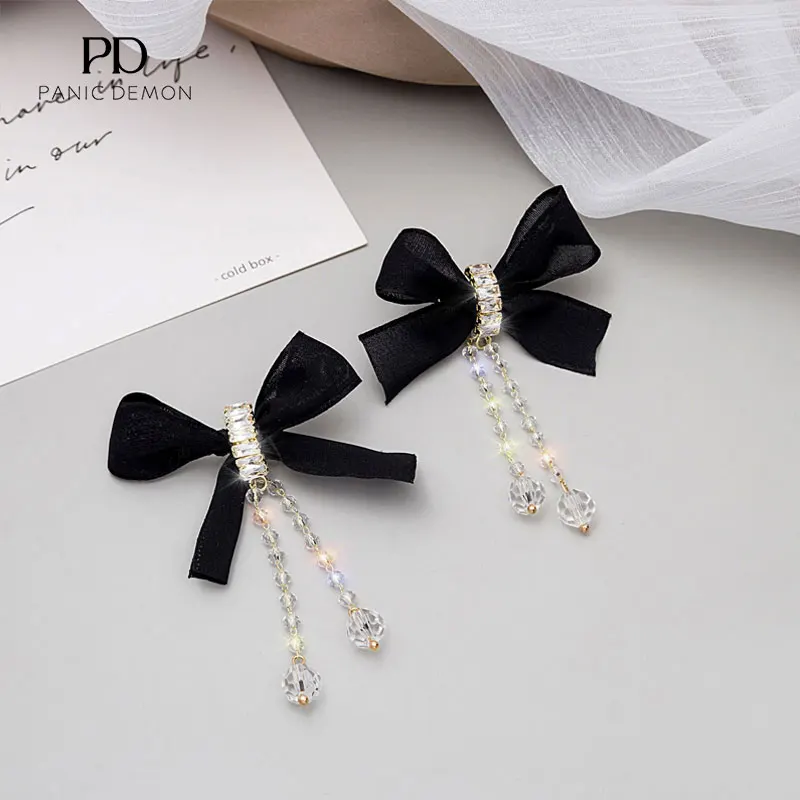 New Japan and South Korea Black Sweet Cool Ribbon Bow Crystal Long Earrings European and American Women Party Earrings Wholesale
New Japan and South Korea Black Sweet Cool Ribbon Bow Crystal Long Earrings European and American Women Party Earrings Wholesale