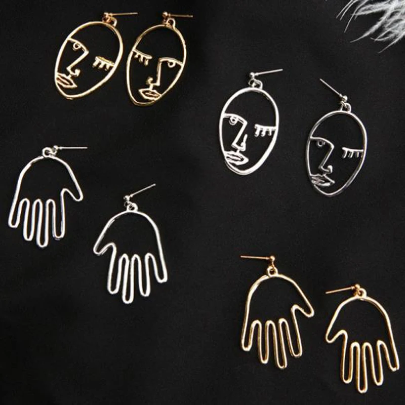 Simple Pop Punk Pendant Earrings Retro Abstract Hollow Metal Face Palm Earrings Personality Ladies Jewelry Jewelry Pendant
Simple Pop Punk Pendant Earrings Retro Abstract Hollow Metal Face Palm Earrings Personality Ladies Jewelry Jewelry Pendant