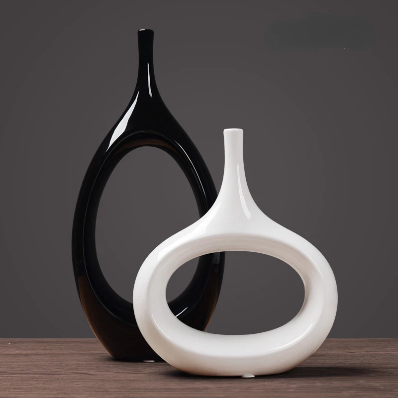 Creative Ceramic Flower Vase Nordic Style Living Room Tabletop Luxury Ornaments Crafts Entrance Abstract Oval Vase Home Decor
Creative Ceramic Flower Vase Nordic Style Living Room Tabletop Luxury Ornaments Crafts Entrance Abstract Oval Vase Home Decor