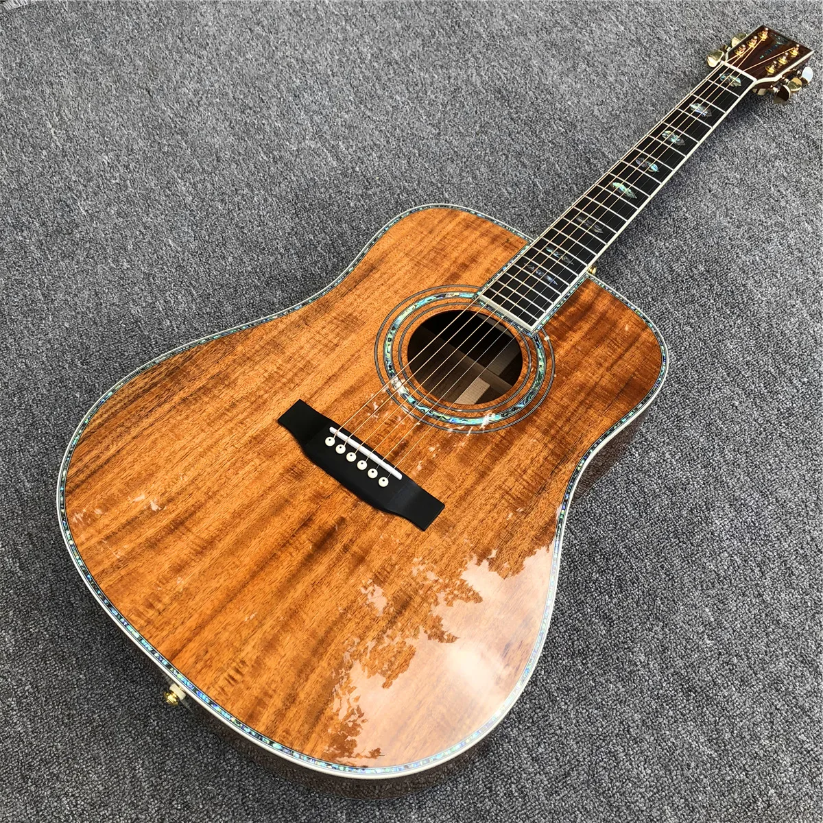 All Koa Wood 41 Inches D Type Acoustic Guitar with Real Abalone Inlays Ebony Fingerboard
All Koa Wood 41 Inches D Type Acoustic Guitar with Real Abalone Inlays Ebony Fingerboard