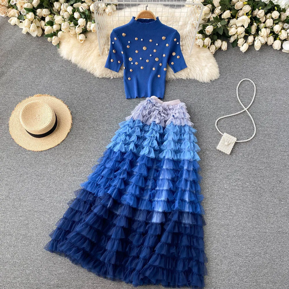Half Turtleneck Pearls Beaded Slim Knitted Sweater T-Shirts Plus Mesh Cake Ruffles Pleated Skirt Two-piece Set Woman Suits Tops
Half Turtleneck Pearls Beaded Slim Knitted Sweater T-Shirts Plus Mesh Cake Ruffles Pleated Skirt Two-piece Set Woman Suits Tops