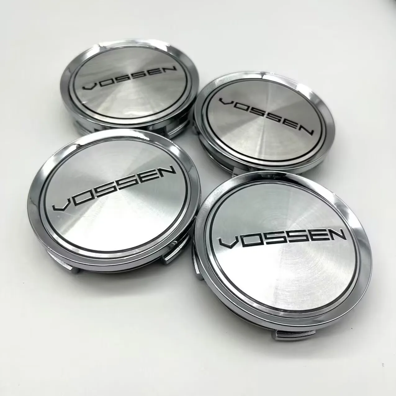 Комплект из 4 колпачков для центра диска Vossen (внешний диаметр 74 мм, внутренний диаметр 69 мм) для автомобильных дисков, защитные пылезащитные пластиковые колпаки, аксессуары
Комплект из 4 колпачков для центра диска Vossen (внешний диаметр 74 мм, внутренний диаметр 69 мм) для автомобильных дисков, защитные пылезащитные пластиковые колпаки, аксессуары