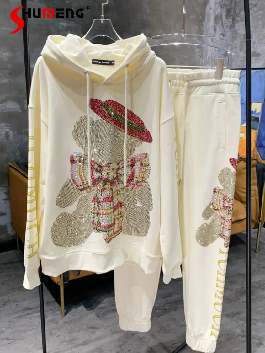 British Fashion streetwear Bow Bear Hot Rhinestone hooded Sweatshirt women's 2023 spring trendy Casual sweatpants two-piece set
British Fashion streetwear Bow Bear Hot Rhinestone hooded Sweatshirt women's 2023 spring trendy Casual sweatpants two-piece set