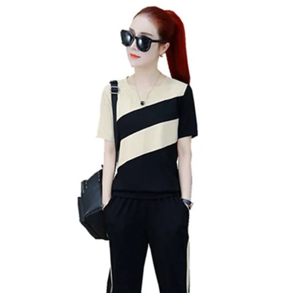 Sports Suit Women's 2022 Summer New Korean Version Loose Large Color Matching Short Sleeve Fashion Running Leisure Two-piece Set
Sports Suit Women's 2022 Summer New Korean Version Loose Large Color Matching Short Sleeve Fashion Running Leisure Two-piece Set