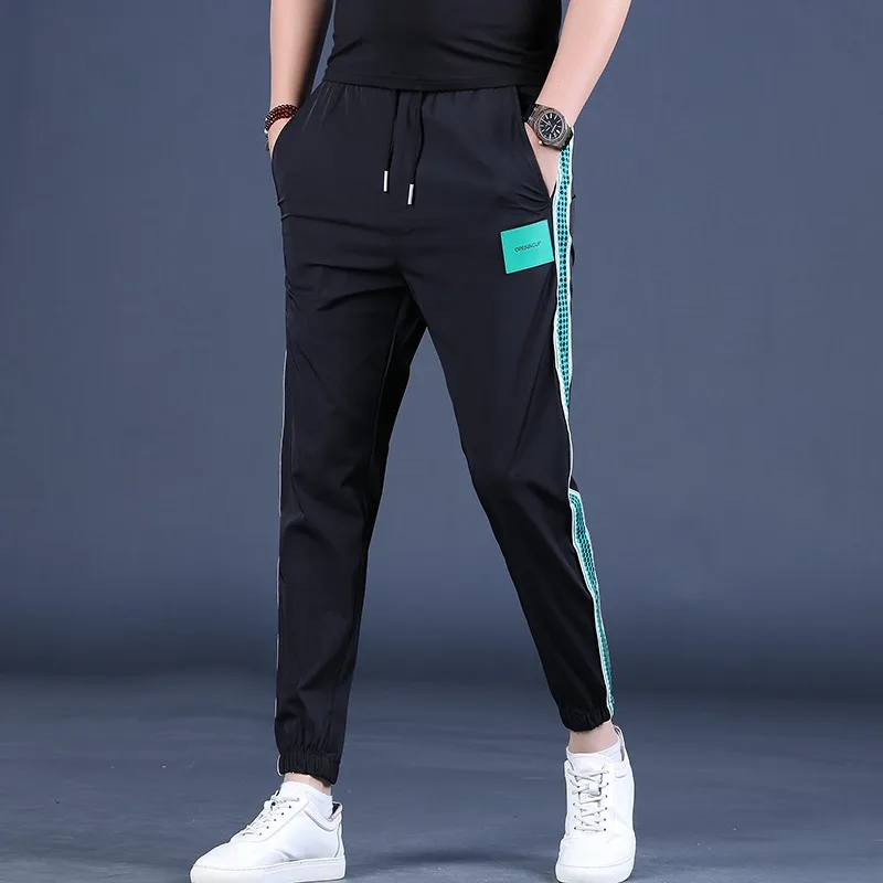 Summer Men Sport Casual Pants Fashion Side Stripe Joggers Streetwear Casual Black Lightweight Elastic Waist Trousers
Summer Men Sport Casual Pants Fashion Side Stripe Joggers Streetwear Casual Black Lightweight Elastic Waist Trousers