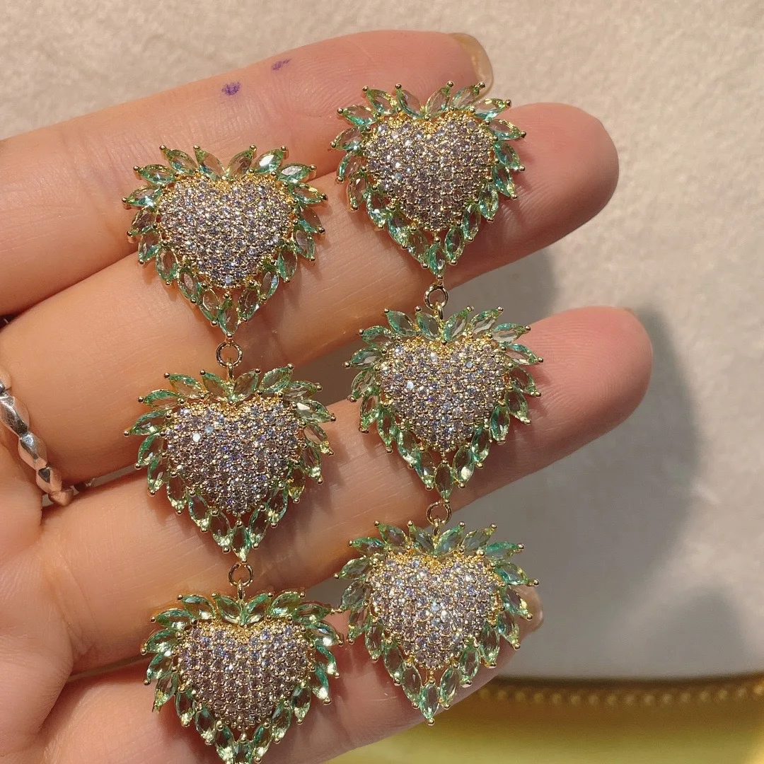 Three new European wind heavy love, full of zircon love long eardrop droplets serging love earrings
Three new European wind heavy love, full of zircon love long eardrop droplets serging love earrings