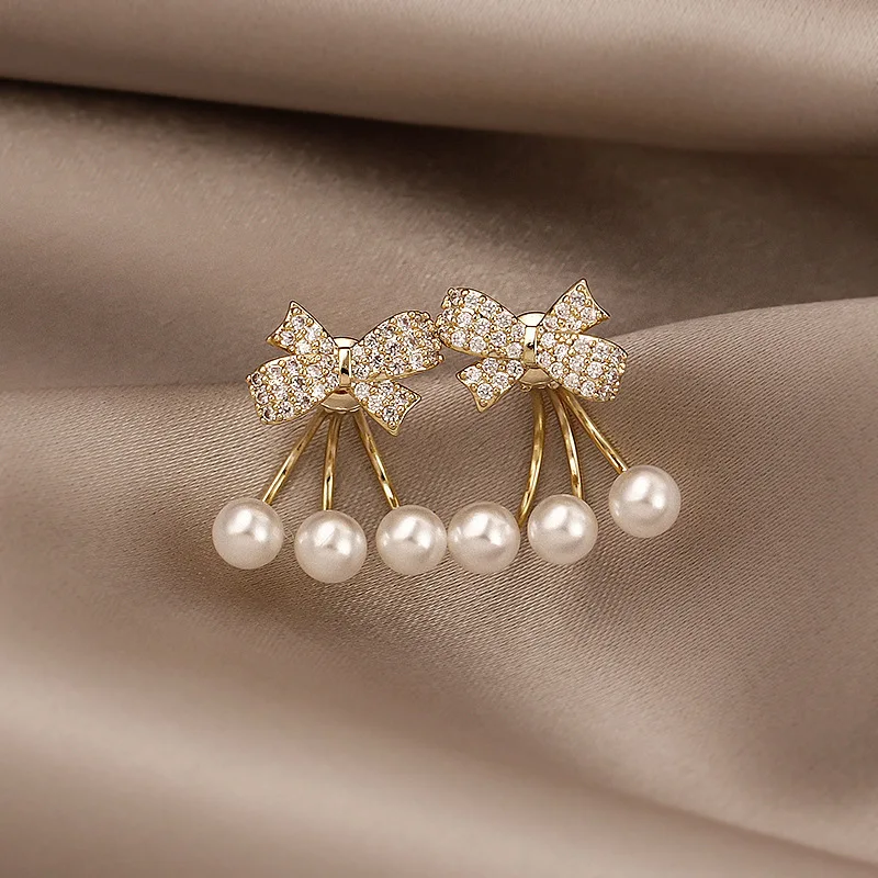 2022 new Han Chao eardrop temperament net red earrings butterfly knot pearl two wear earrings female wholesale
2022 new Han Chao eardrop temperament net red earrings butterfly knot pearl two wear earrings female wholesale