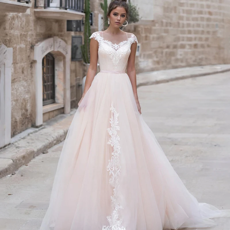 Elegant A-Line O-Neck Wedding Dress 2022 Boho Short Sleeve Lace Appliques Bridal Gown Spaghetti Straps Button Tulle Sweep Train
Elegant A-Line O-Neck Wedding Dress 2022 Boho Short Sleeve Lace Appliques Bridal Gown Spaghetti Straps Button Tulle Sweep Train