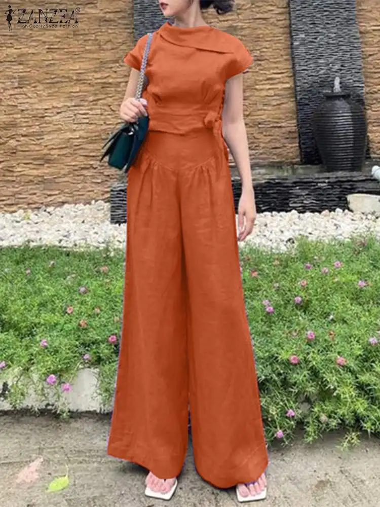 2023 ZANZEA Elegant Work OL Matching Sets Woman Short Sleeve O-Neck Blouse Wide Leg Trousers Fashion Solid Tracksuits Oversized
2023 ZANZEA Elegant Work OL Matching Sets Woman Short Sleeve O-Neck Blouse Wide Leg Trousers Fashion Solid Tracksuits Oversized