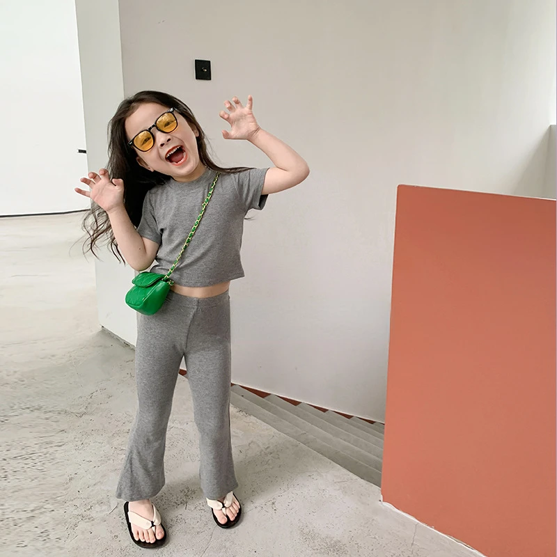 Summer girls solid color slim clothes sets children cotton short style Tee and slim flared trousers 2pcs sets
Summer girls solid color slim clothes sets children cotton short style Tee and slim flared trousers 2pcs sets