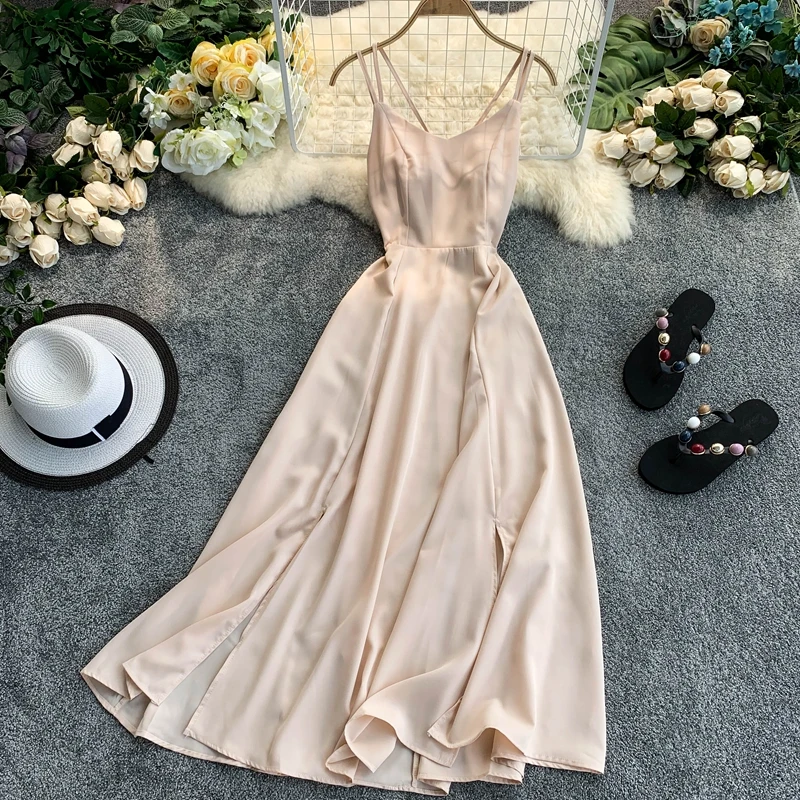 Seaside resort beach skirt V-neck cross sling careful machine exposed back thin hem split skirt dress women
Seaside resort beach skirt V-neck cross sling careful machine exposed back thin hem split skirt dress women