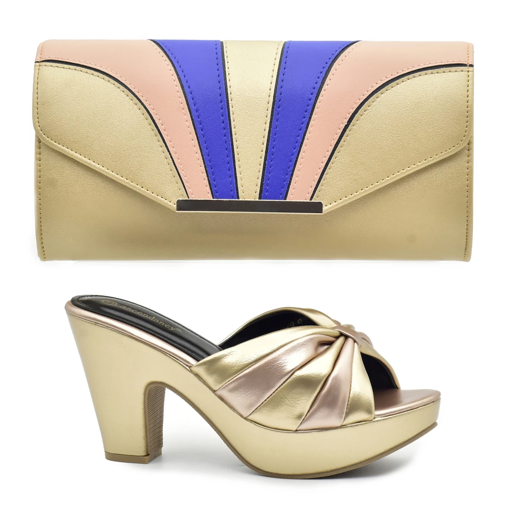 New Golden color Italian Shoes With Matching Bags African Women Shoes and Bags Set For Prom Party Summer Sandal 2023
New Golden color Italian Shoes With Matching Bags African Women Shoes and Bags Set For Prom Party Summer Sandal 2023