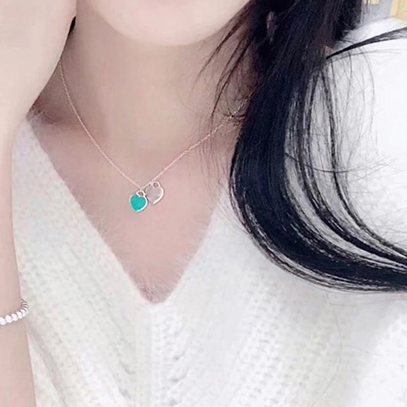 Green Blue Color Double Heart Necklace Label Pendant Street Men And Women With Collarbone Chain Temperament Choker Collar 2022
Green Blue Color Double Heart Necklace Label Pendant Street Men And Women With Collarbone Chain Temperament Choker Collar 2022