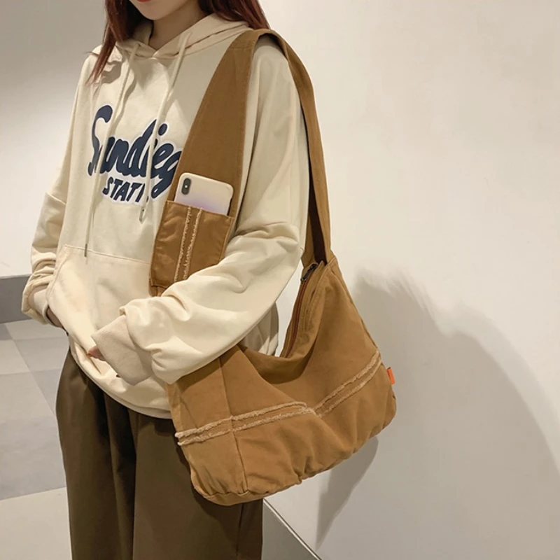Fashion Ladies Messenger Bag Large Capacity Shopping Bag Unisex Canvas Student Shoulder Bag Solid Color Handbags for Women
Fashion Ladies Messenger Bag Large Capacity Shopping Bag Unisex Canvas Student Shoulder Bag Solid Color Handbags for Women