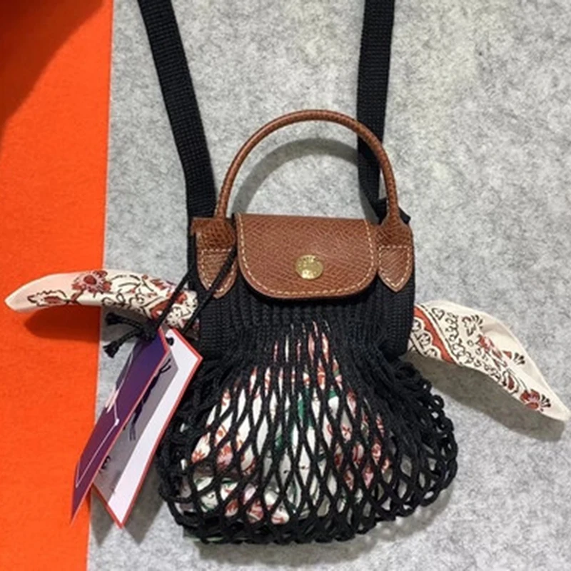 Fashion Mini Fishnet Women Handbags Designer Hollow Shoulder Bags Luxury Handmade Woven Crossbody Bag Summer Beach Small Tote
Fashion Mini Fishnet Women Handbags Designer Hollow Shoulder Bags Luxury Handmade Woven Crossbody Bag Summer Beach Small Tote