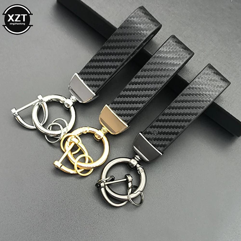 Universal Car Key Chain 360 Degree Rotating Carbon Fiber Style Leather Car Key Rings Holder Bag Pendant High-Grade for Men Women
Universal Car Key Chain 360 Degree Rotating Carbon Fiber Style Leather Car Key Rings Holder Bag Pendant High-Grade for Men Women
