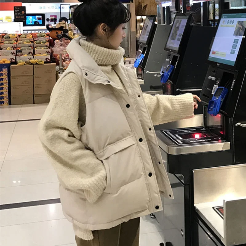 Winter Jacket Women Parkas Vest 2022 New Snowsuit Fashion Pocket Sleeveless Loose Korean Large Size Solid Female Casual Coats
Winter Jacket Women Parkas Vest 2022 New Snowsuit Fashion Pocket Sleeveless Loose Korean Large Size Solid Female Casual Coats